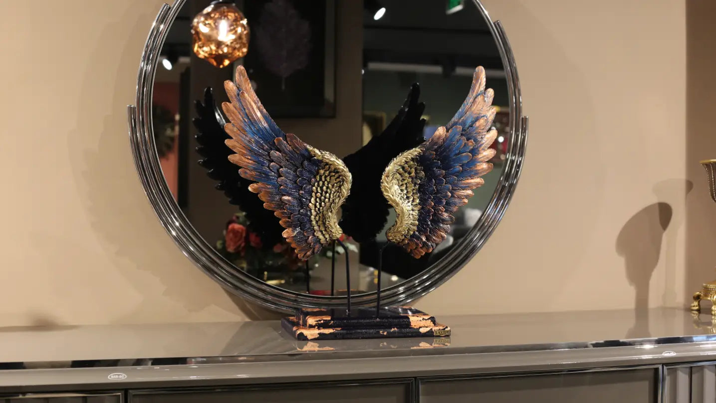 angle wings front view next to big mirror