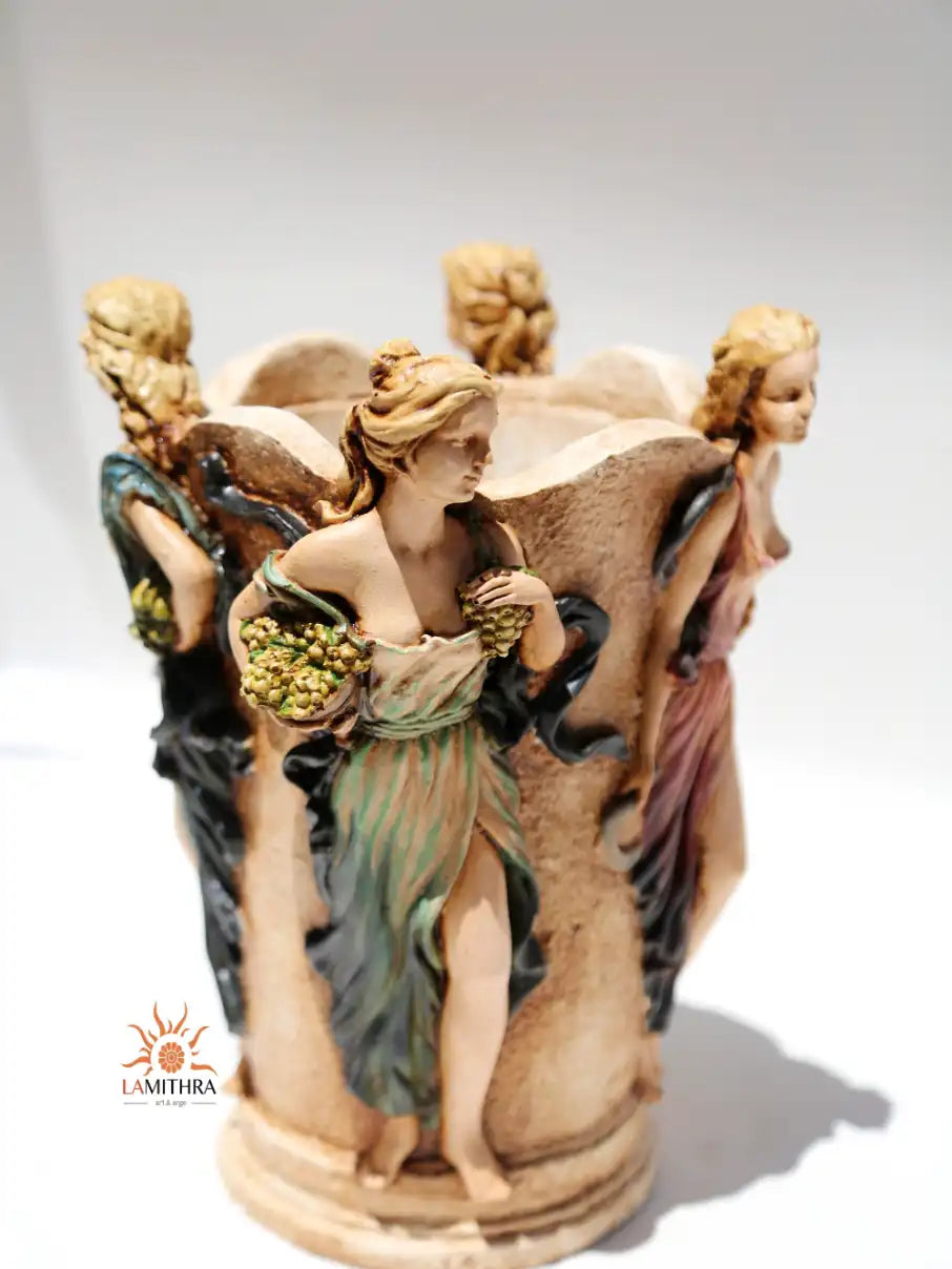 ancient hand-painted female figurine vase top-down look.