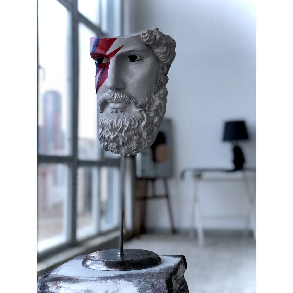 Poseidon statue facing the window in the studio